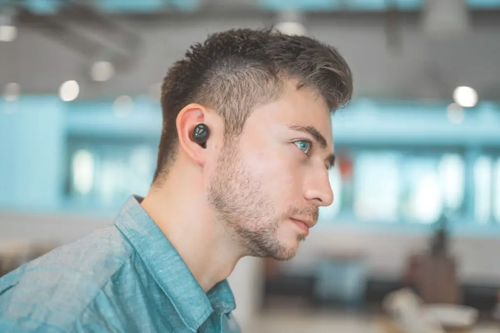 man wearing wireless earbuds